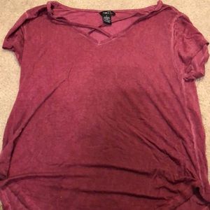 red shirt with x in front